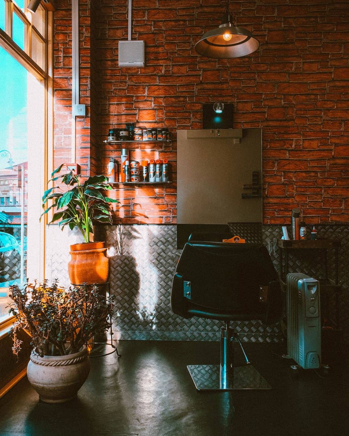 A salon with styling chairs and mirrors: the client's homepage preview